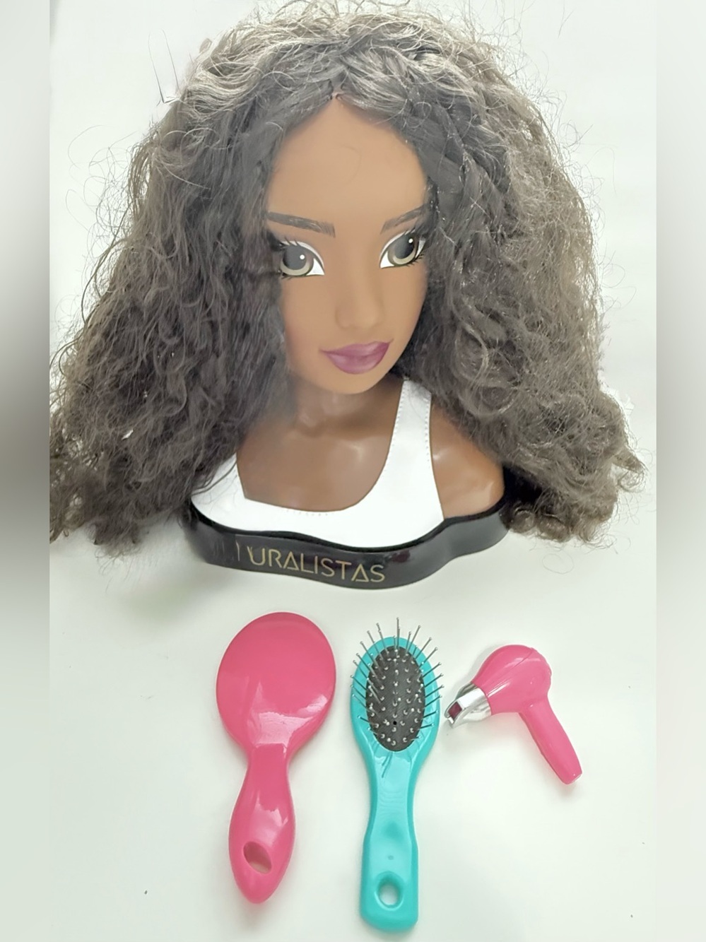 Styling Head with Brown Hair and Pink/Teal Accessories